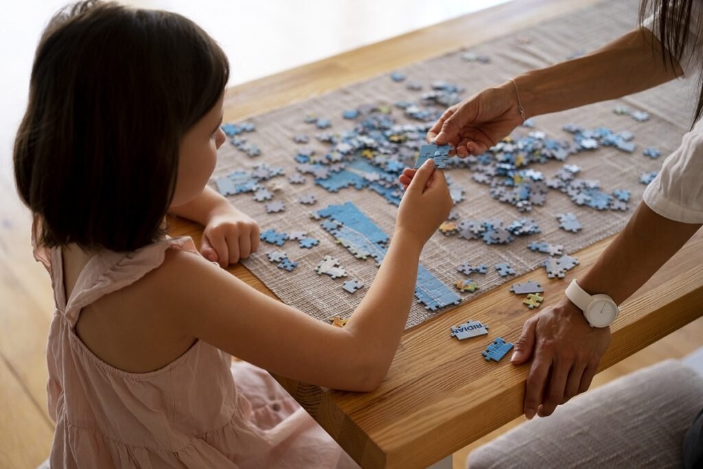 Development of motor skills in children: games that develop hand motor skills Girl-playing-with-brain-teaser-toys